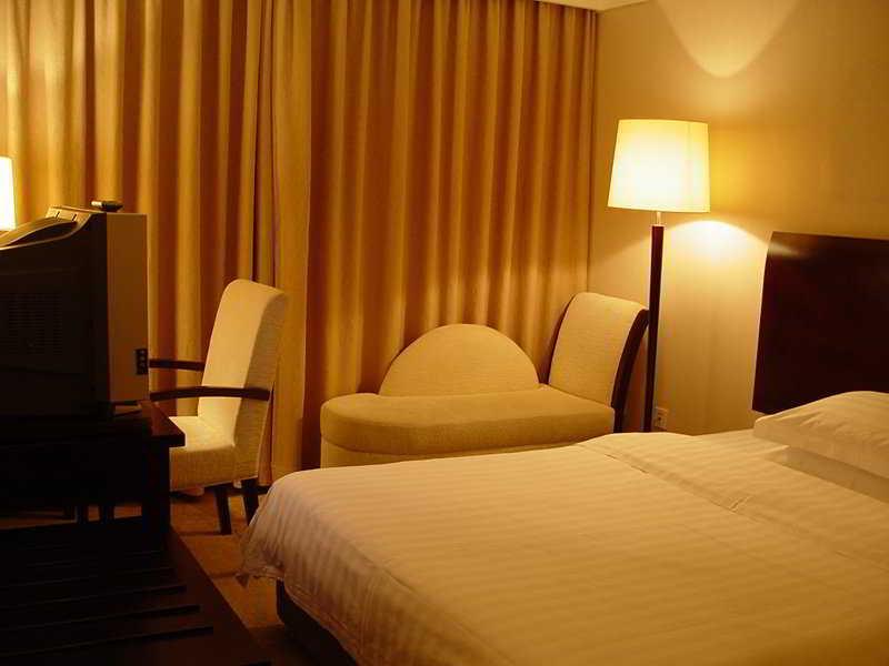 Redwall Hotel Пекін Номер фото